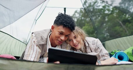 Camping, tablet and couple in tent watching online for streaming subscription, movies and internet videos. Holiday, travel and man and woman on tech for bonding, relax and entertainment in nature