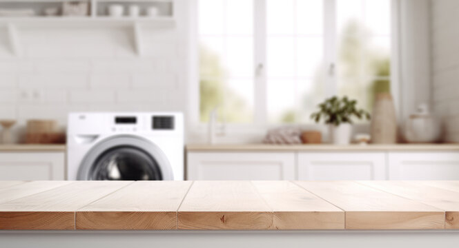 Empty wooden table top with blurred white laundry room interior background for product display montage, white washing machine and dryer in the background