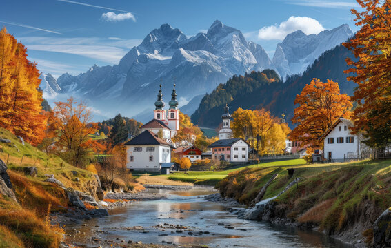 A picturesque autumn scene of the idyllic village in Tirol, with its white houses and colorful trees, set against rolling green hills and surrounded by majestic mountains under clear blue skies