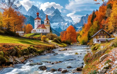 Foto op Canvas A picturesque autumn scene of the idyllic village in Tirol, with its white houses and colorful trees, set against rolling green hills and surrounded by majestic mountains under clear blue skies © Kien