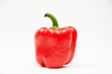 large red juicy peppers on a white background	