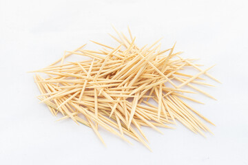 A toothpick is a small thin stick of wood with pointed ends to insert between teeth to remove...