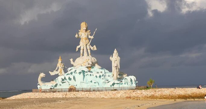 Statue of Varuna in Pantai Jerman Beach in Kuta, Bali Island, Indonesia 