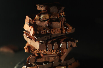 A stack of different chocolate pieces	