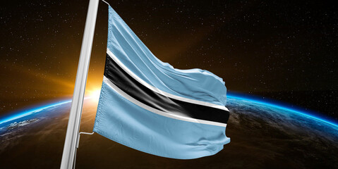 Botswana national flag cloth fabric waving on beautiful global Background.