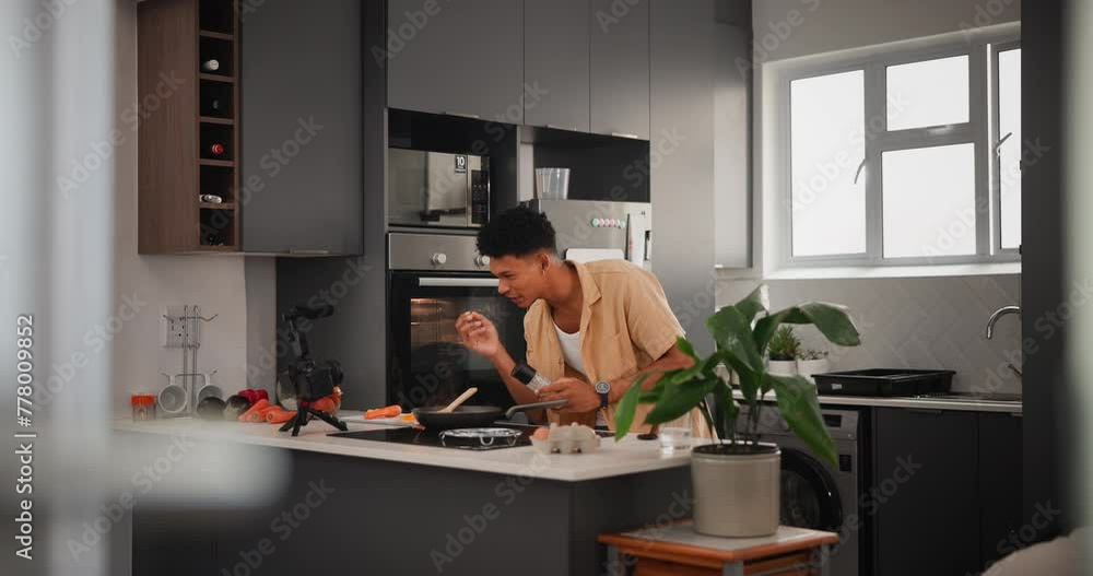 Poster influencer, man and cooking in kitchen or vlog with camera for food streaming and content creation. 