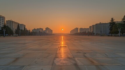 Obraz premium Sunrise on Empty City Square with Shadows