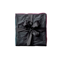 Obraz premium Black gift in black paper with bow