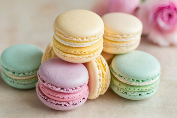 Fototapeta na wymiar Vintage pastel colored French macaroons or macarons