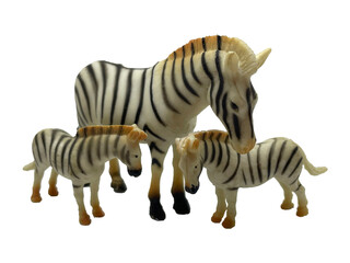 Zebra mom with two cubs on a white background. Animal zebras. Zebra toys with cubs on a white background