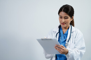 Doctor using clipboard and digital tablet find information patient medical history at the hospital. Medical technology concept. - obrazy, fototapety, plakaty