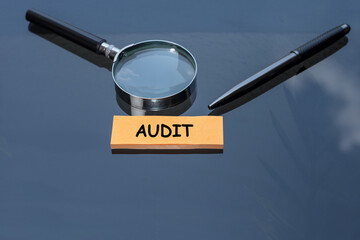 AUDIT concept. Examination and valuation of the financial position of a company or organization
