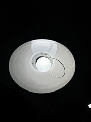 white light in close up in dark background in night. Intriguing close-up of a white light against a dark night background, capturing the contrast and mystery of nocturnal scenes. 