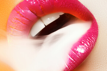 Close-up of woman's lips with fashion red make-up. Beautiful female mouth, full lips with perfect...