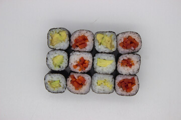 Colorful Vegetable Sushi Rolls on White Background