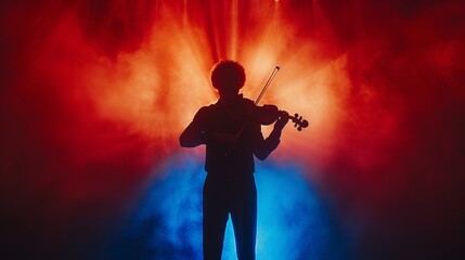 Fototapeta premium A man playing a violin in a red and blue background. The image has a mood of mystery and intrigue