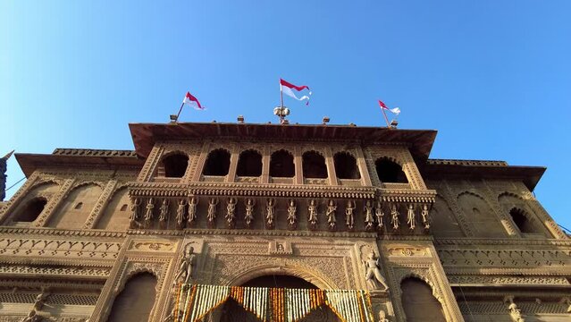Maheshwar, Madhya Pradesh, INDIA - February 24, 2024, Exterior View of the scenic tourist landmark Maheshwar fort (Ahilya Fort) and temple. This monument is on the banks of the Narmada River.
