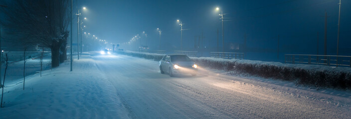 A car on a winter road, moving
