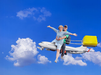 Smiling couple tourist sitting on airplane flying to honeymoon, travelling around the world Concept