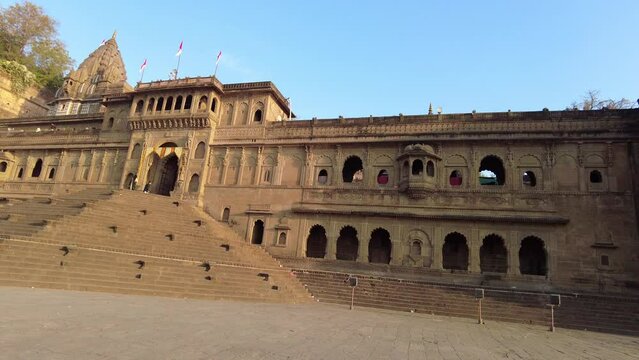 Maheshwar, Madhya Pradesh, INDIA - February 24, 2024, Exterior View of the scenic tourist landmark Maheshwar fort (Ahilya Fort) and temple. This monument is on the banks of the Narmada River.