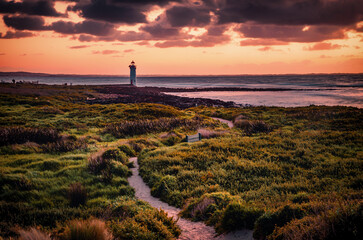 The view of the Griffiths Island and the Port Fairy Lighthouse at dawn