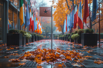 Flag on Pole Surrounded by Leaves