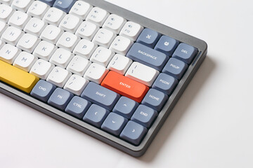 Cute and slim mechanical keyboard. Programming keyboard on a white background