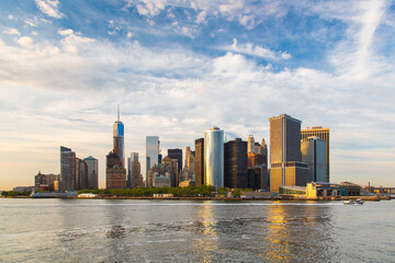 Lower Manhattan of NYC New York City taken from liberty island. This also known as Downtown Manhattan or Downtown New York the largest business district in state of New York and USA. - obrazy, fototapety, plakaty