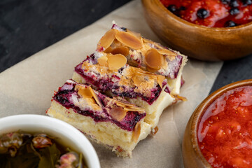 delicious dessert with cottage cheese cream with strawberries and almonds