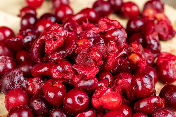 ripe frozen red cherries, close up