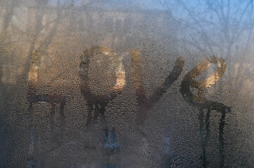 love is written on wet glass.