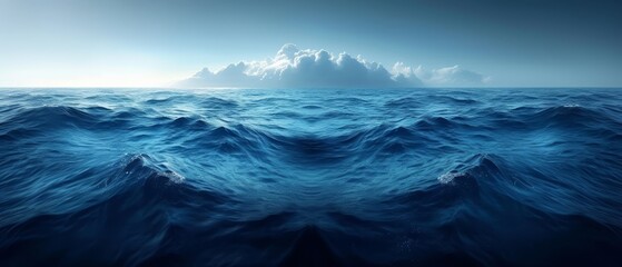 Fototapeta premium a large body of water with waves in the foreground and a large cloud in the sky in the background.