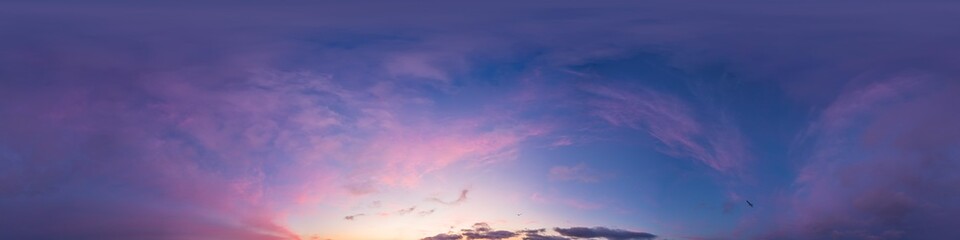 Bright sunset sky panorama with glowing red pink Cirrus clouds. HDR 360 seamless spherical...