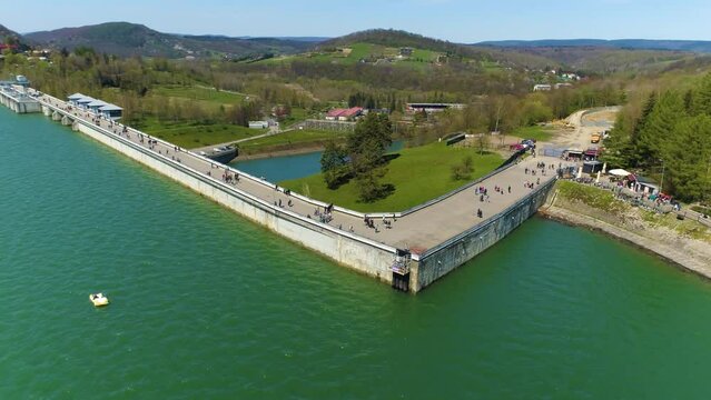 Tourists On The Water Dam On Solina Lake Bieszczady Mountains Aerial View Poland