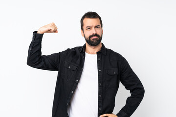 Young man with beard over isolated white background doing strong gesture