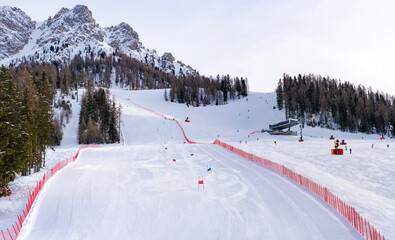 Fototapeta na wymiar Winter view of slalom ski slope in Kronplatz in Italian Dolomites