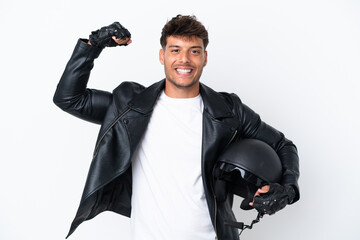 Young caucasian man with a motorcycle helmet isolated on white background doing strong gesture