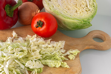 vegetables for salad or soup: tomato, cabbage, zucchini, sweet pepper, onion and herbs