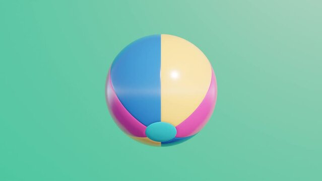 Beach ball rotates on a green background. Simple 3d object animation. Realistic sport equipment render