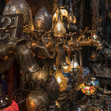 Copper and brass taps, and other items, for sale in the Medina and Souks of Marrakesh in Morocco.