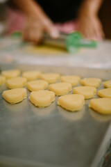 The cake dough has been molded into a love shape. This cake is a type of 