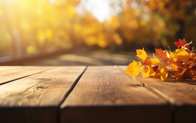 Naklejka na ściany i meble a yellow leaves on a wooden surface