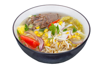 Thai style noodle soup with beef and vegetables isolated on white background