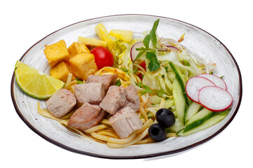 Noodles with tuna and vegetables on a white background. Isolated