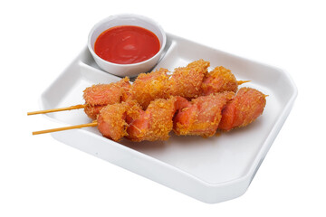 Fried pork skewer on white plate isolated on white background.