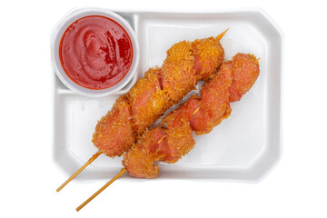 Fried pork skewer on white plate isolated on white background.