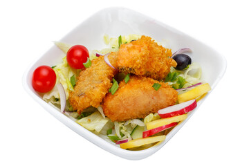 Fried fish with salad in a bowl isolated on a white background