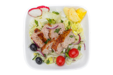 Salad with meat and vegetables. Isolated on a white background.