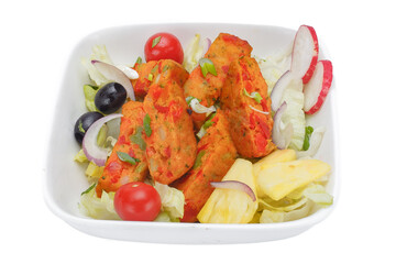 Salad with pork and vegetables on a white background. Isolated