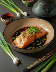 A salmon steak marinating in a soy sauce-based marinade, garnished with sesame seeds and green onions, set on a counter with Asian cooking utensils, emphasizing the fusion of flavors